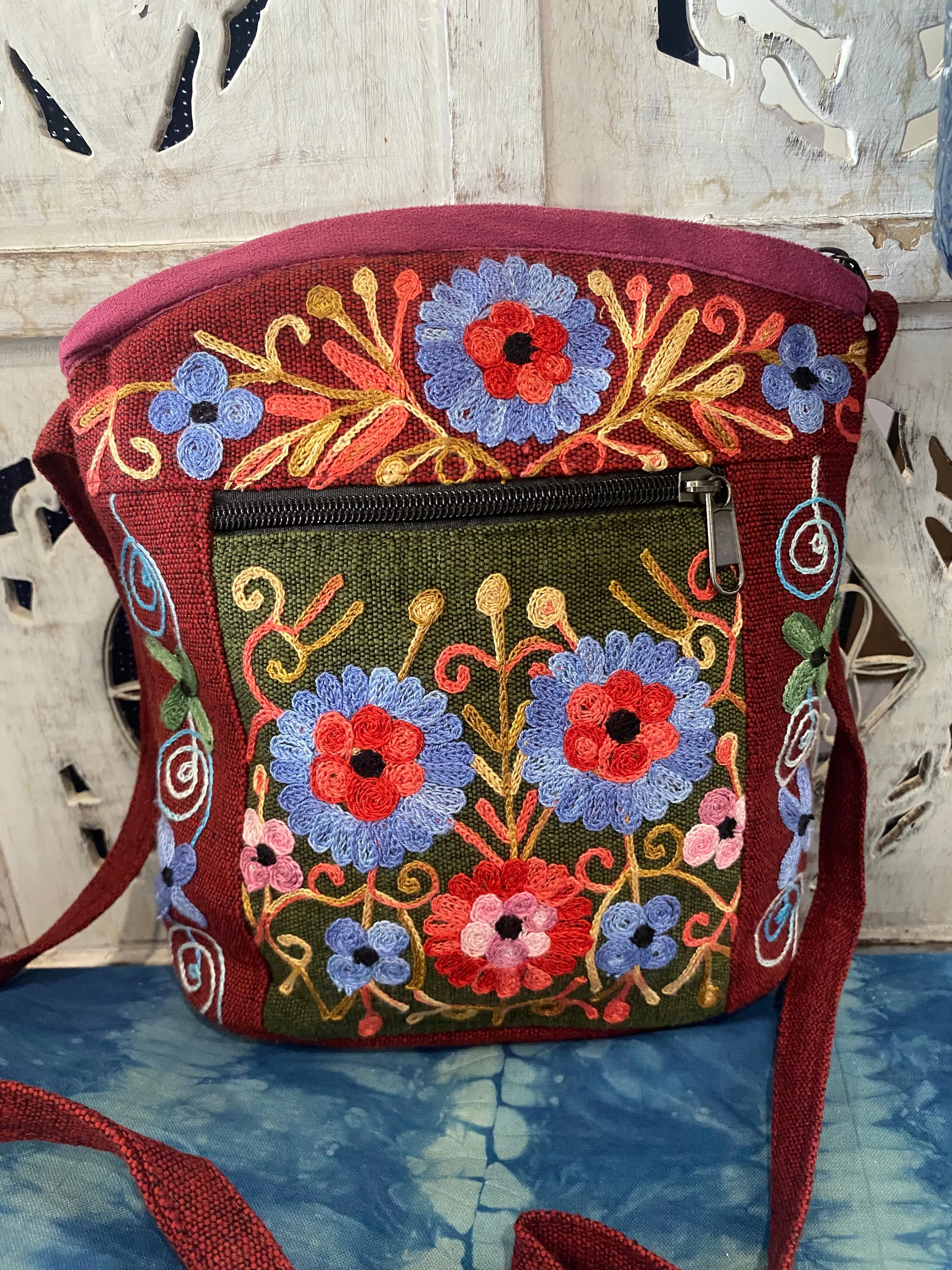 LWH Embroided Round Top Flower Handbag with shoulder strap.